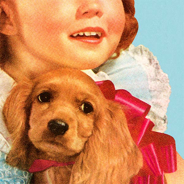 Girl holding puppy